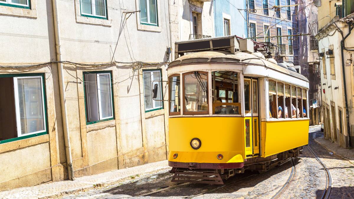 WINDING CITY: A vintage tram in the centre of Lisbon.