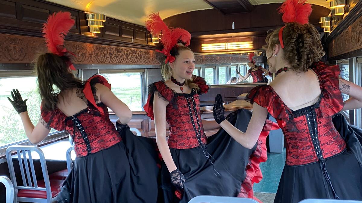 Yeehaw! All aboard for some rollicking song and dance with the Saloon Girls.
