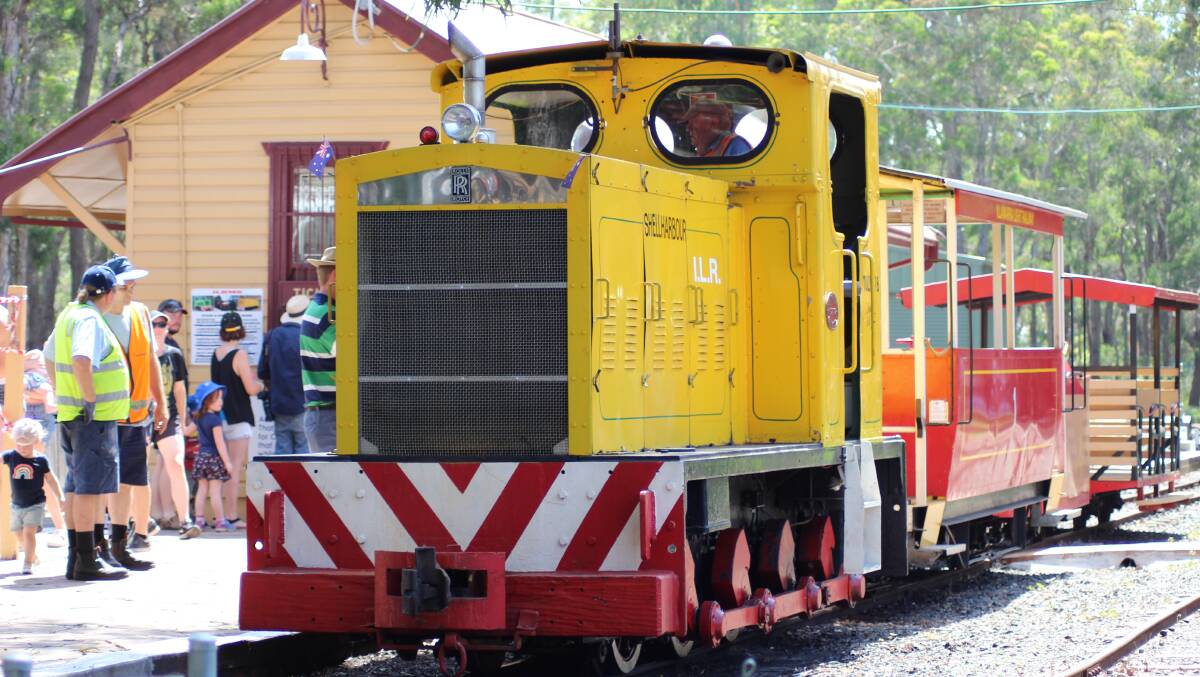 ALL ON BOARD: The former sugar cane locomotive Shellharbour pulls in at
Illawarra Light Rail Museum.