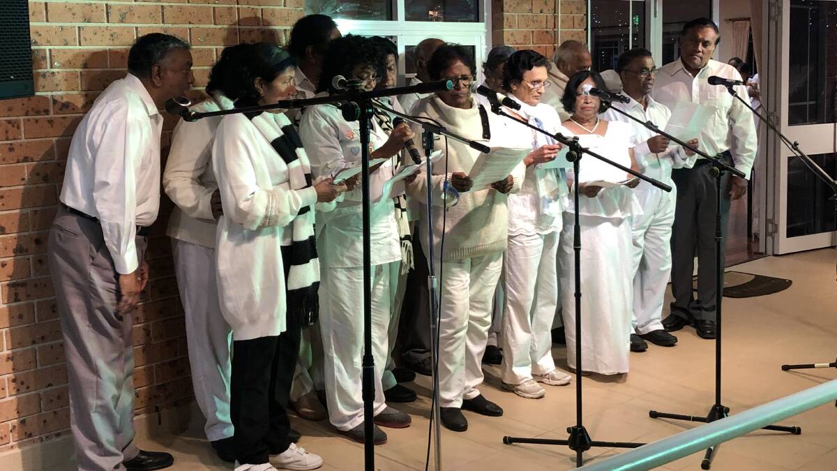 UNITED WE STAND: A choir in full voice at a community get-together where former Sydney alderman Katherine Greiner was the special guest.