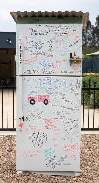 WRITTEN INTO HISTORY: The fridge has become a tribute to mateship and community resilience.