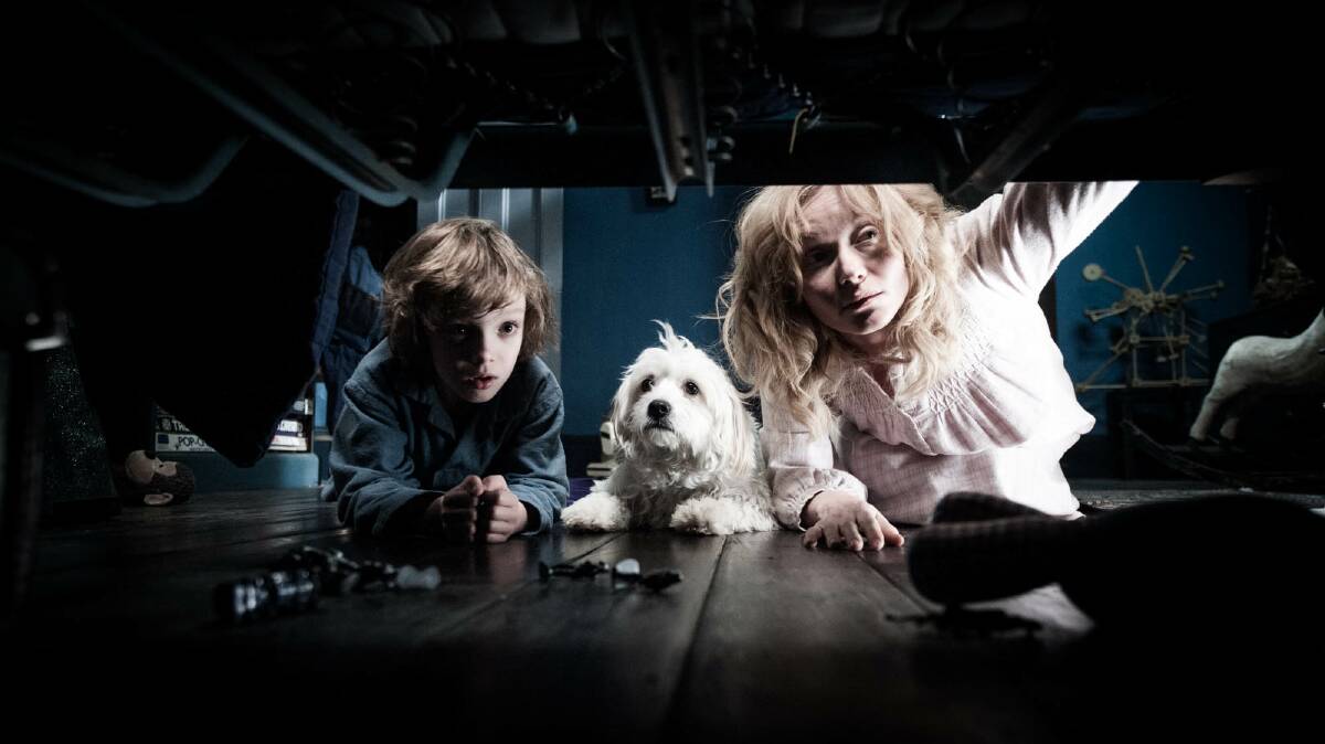 CHILLING: Noah Wiseman, Hachi and Essie Davis in The Babadook.
