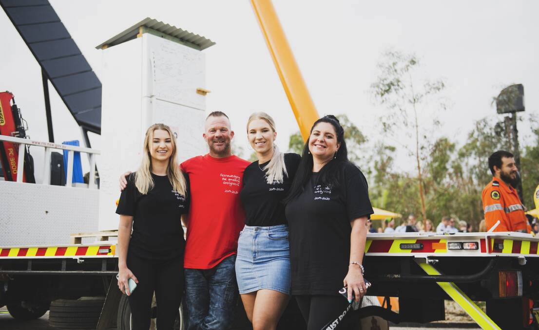 FREEZER JOLLY GOOD FELLOWS: Chloe, Scott, Dannielle and Claire Hooper with the now famous fridge. Picture: Dion Georgopoulos/Canberra Times/ACM