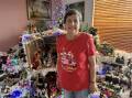 Helen Moniodis with her collection of Nativity scenes and Christmas ornaments. "Every day I like to sit still for 10 minutes and just enjoy it. It makes me happy," she says. Picture supplied.
