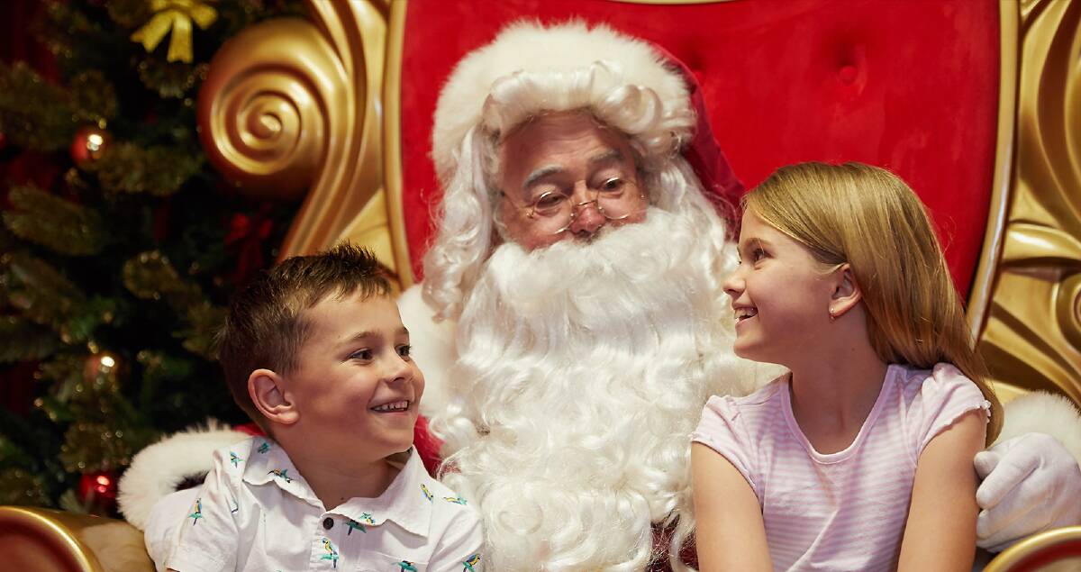YES, WE'VE BEEN NICE: Santa Claus and his helpers are back in a big way and youngsters are getting excited. 