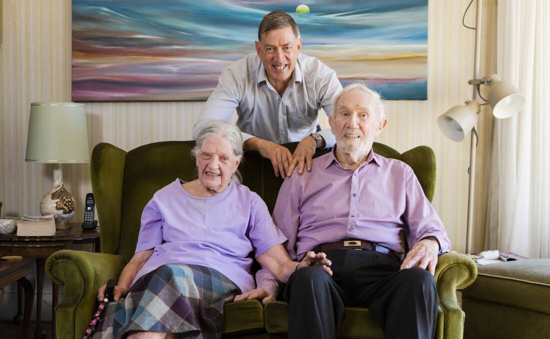 Jeff Knowles with his parents Beth Knowles, 92, and Mervyn Knowles, 97, who have been waiting for home care packages for 13 months, but count themselves as fortunate. Picture: Jamila Toderas
