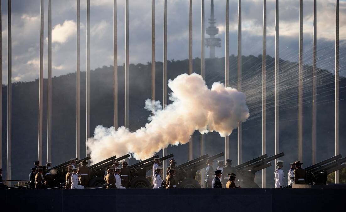 A large crowd gathered at Parliament House on Saturday afternoon as the Duke of Edinburgh Prince Philip was honoured with a 41-gun salute. Picture: Sitthixay Ditthavong