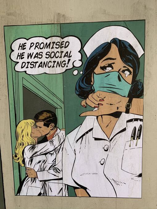 LOVE IN THE TIME OF CORONAVIRUS: An artwork along the lines of Roy Lichtenstein's famous send-ups of comic book panels brightens up Scott Alley.