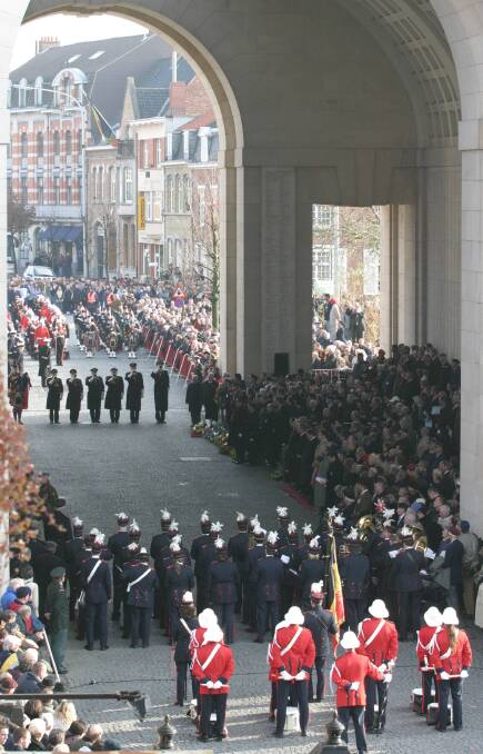 Crowds gather for the playing of the Last Post at Menin Gate, Ypres.