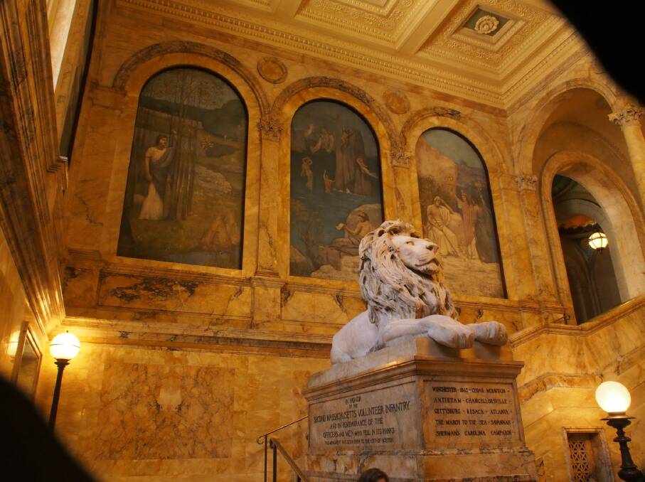 The magnificent twin lions made of unpolished Siena marble in the Boston Public Library.​