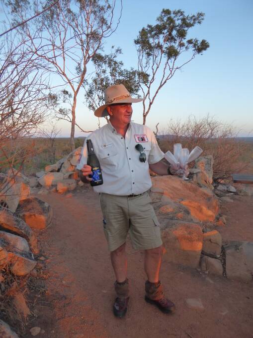 Bram has the champagne flutes at the ready during the sunset tour. Courtesy Tourism and Events Queensland.
