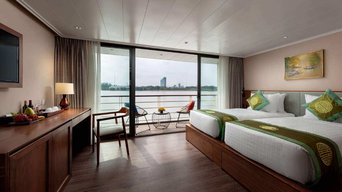 Rest easy in your deluxe cabin on Victoria Mekong.