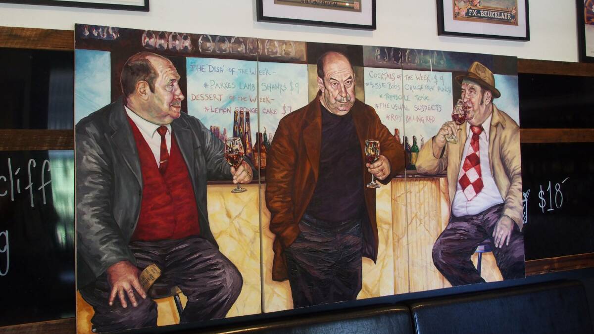 CHEERS: A painting of Aussie actor Roy Billing surveys drinkers in the Brewhouse's Whisky Bar.