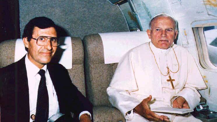 FRIENDS IN HIGH PLACES: John was part of the Pope John Paul II's entourage when the Pontiff toured Australia and five other countries in 1986.