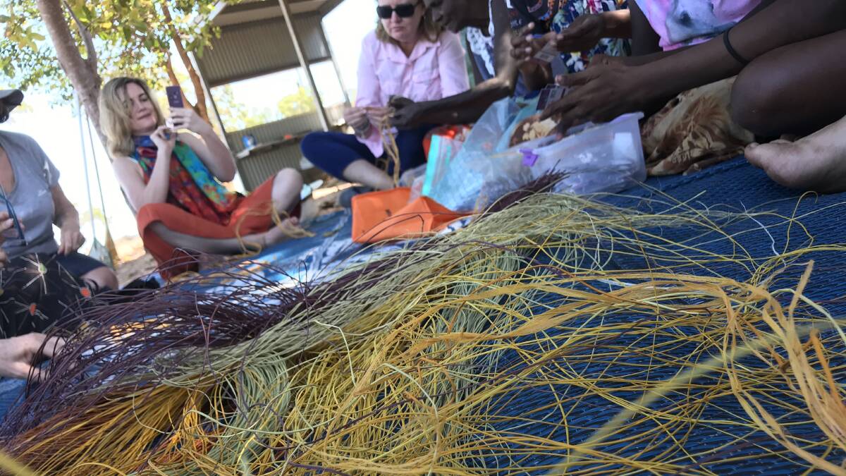 SHARING AND LEARNING: Weaving with the women involves sitting around, chatting about life, love, loss and our greatest joys.