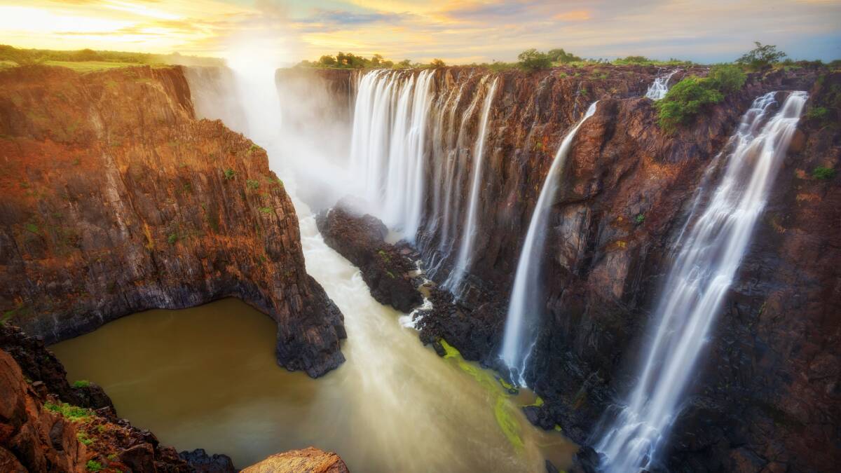 SPECTACULAR: The mist from the mighty Victoria Falls can be seen 20km away.