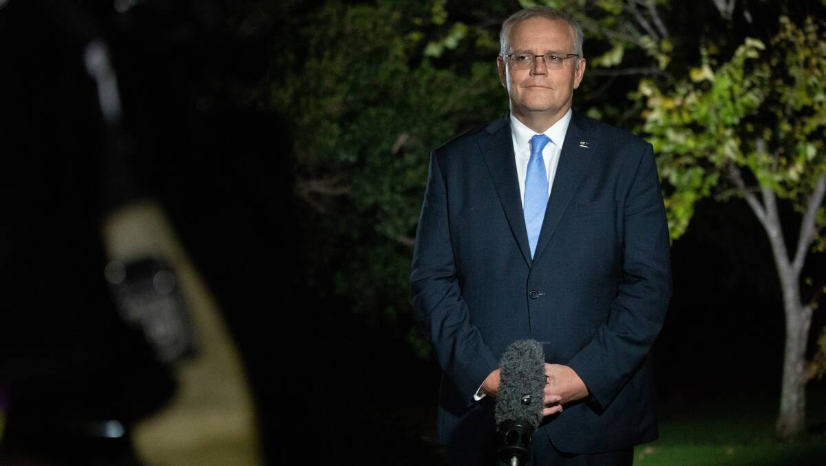 After calling the election Scott Morrison does a live cross at Coolangatta Estate winery near Shoalhaven Heads. Picture: James Croucher