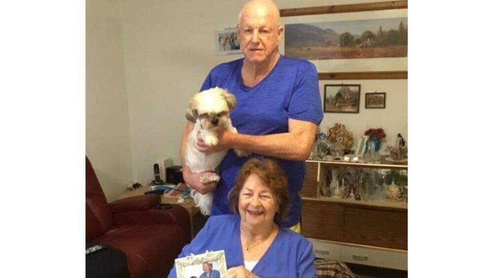 WEDDED BLISS: Denis and Rosina Mariàe Grieve and their dog Blossom.