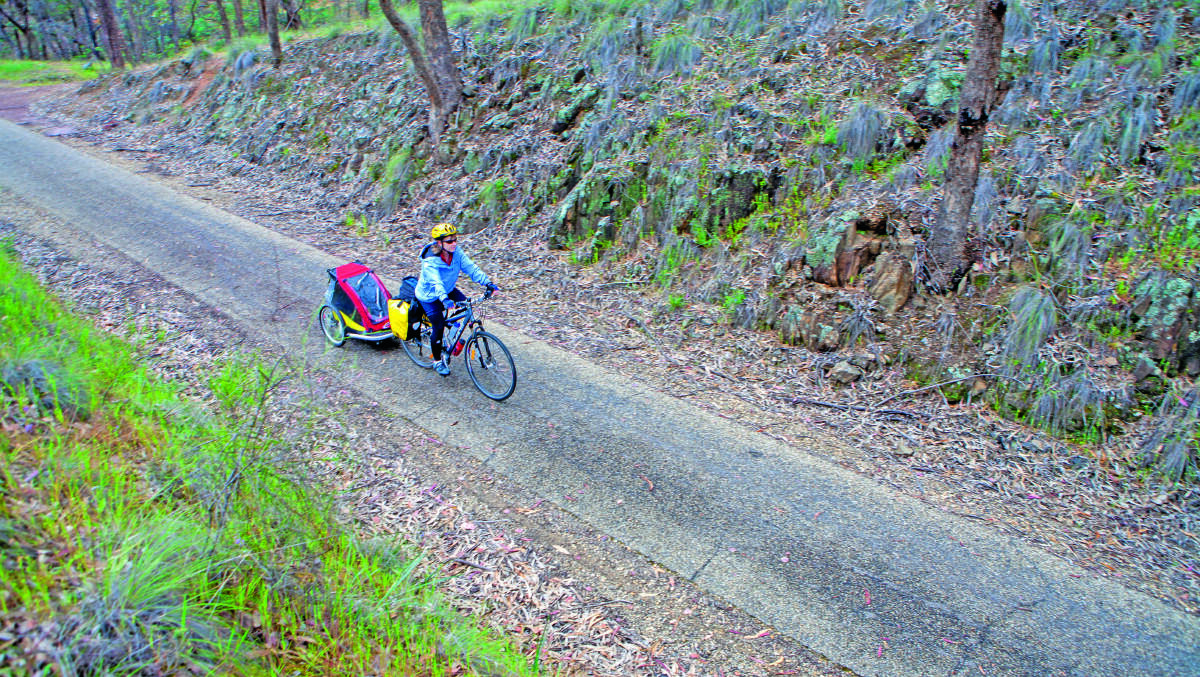 Cyclist climbing on the side trail to Beechworth.