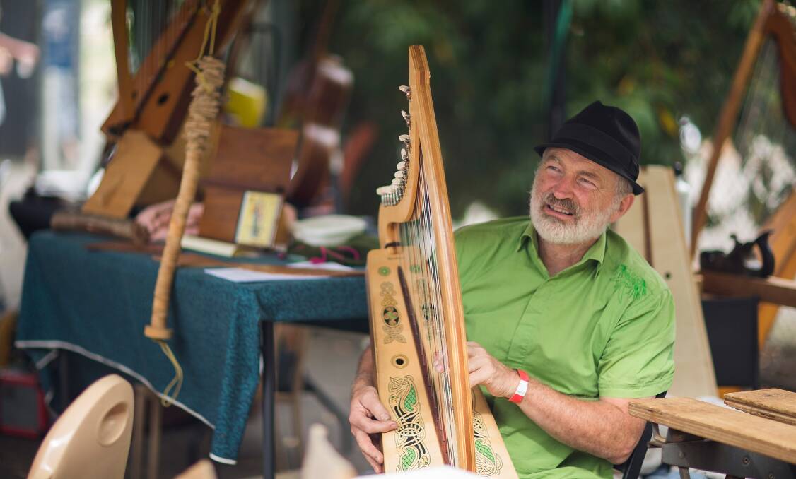 Harp-maker Andy Rigby plies his art at the Lost Trades Fair. 
