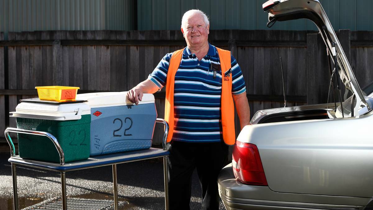 Russell Leviston unpacks after a morning round delivering meals in Ballarat for Meals On Wheels in 2019. The service is continuing during the coronavirus outbreak. Picture: Adam Trafford.