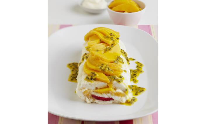 Try this yummy Passionfruit, Mango and Strawberry Pavlova Roll.