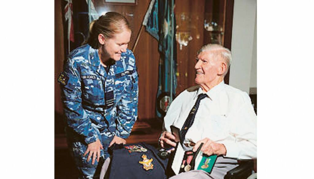 REASON TO SMILE – Flight Lieutenant Kristina Filipi chats with Lachie Campbell at the awards ceremony.