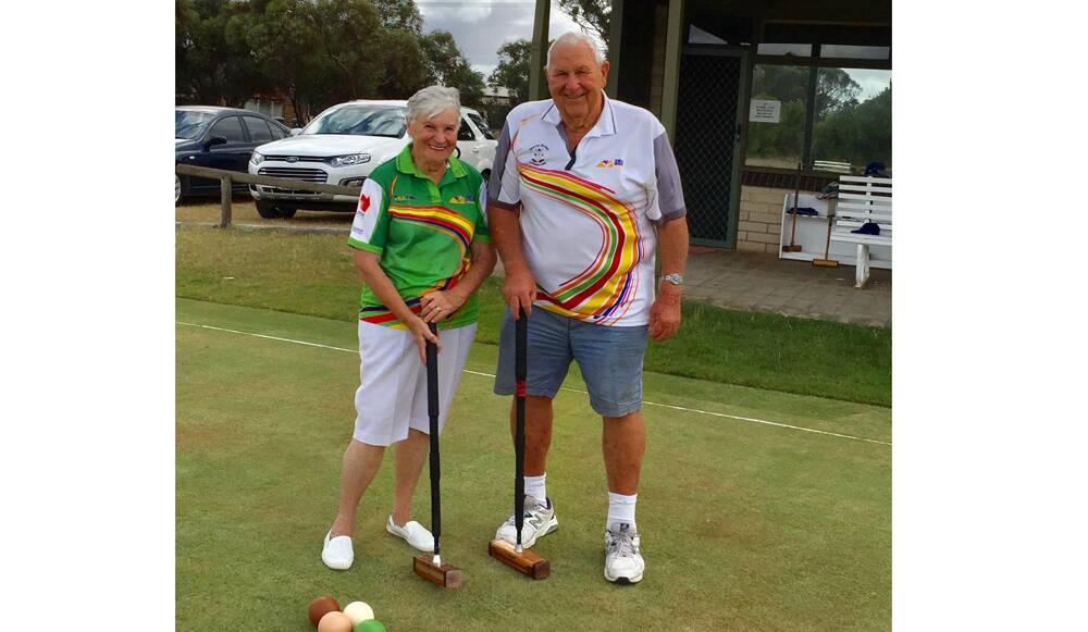 MALLETS AT THE READY – Lesley and Ken Zadow  prepare for the Murray Bridge Green Masters Games.