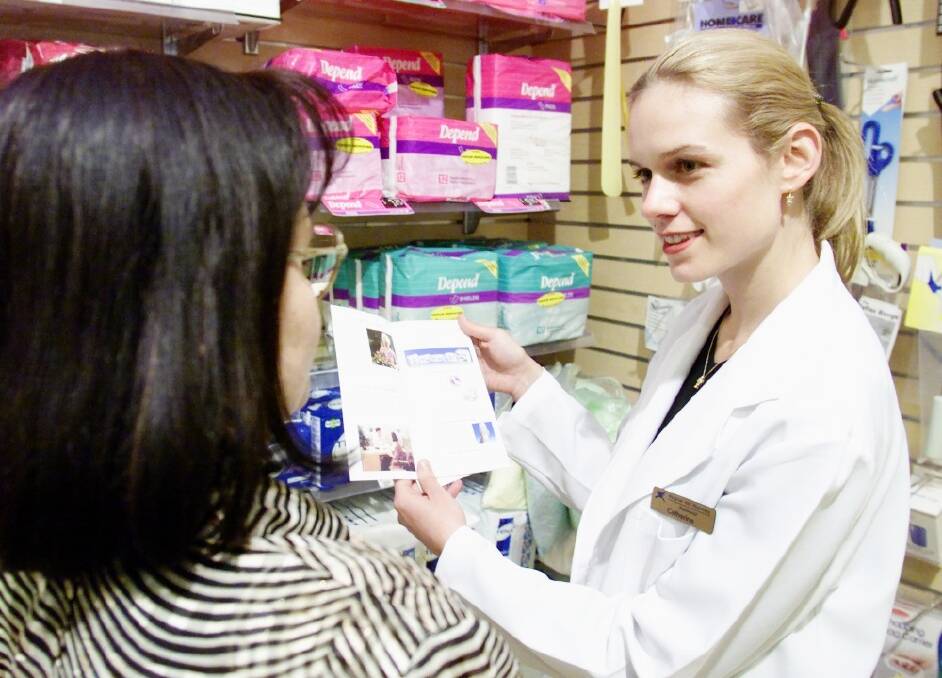 NO ACCIDENT - A pharmacist talks to a customer about incontinence products.