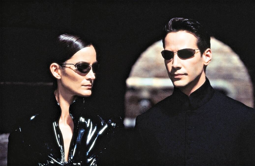STAR APPEAL - The Matrix, starring Carrie-Anne Moss (left) and Keanu Reeves, made the smaller 'microshades' popular in the late 90s.