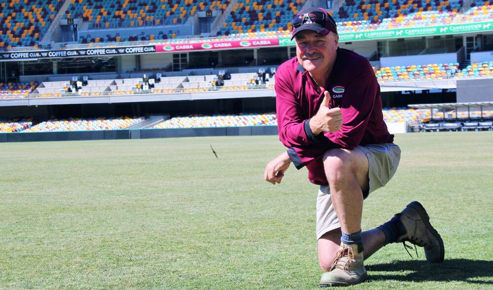 GREEN, GREEN GRASS – Kevin Mitchell Jr checks out the turf at the Gabba. Photo: HEATHER GRANT-CAMPBELL