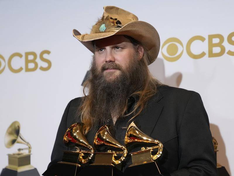 Chris Stapleton won Grammys for best country album, song and solo performance.