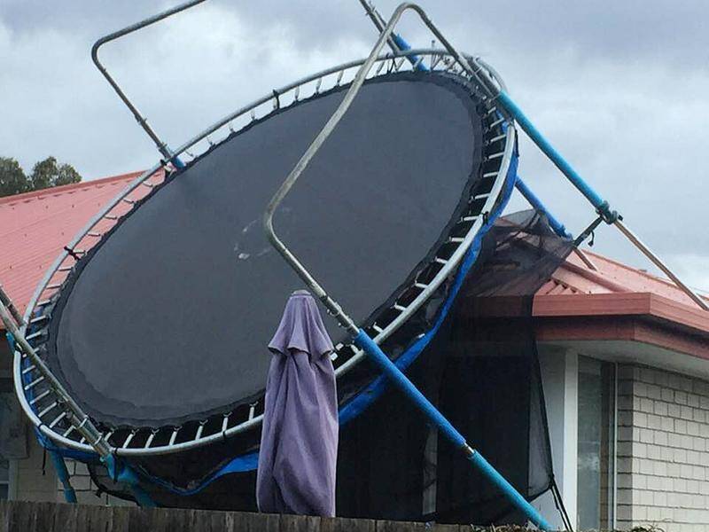 A trampoline has pierced the roof of a Hobart home as wild winds lashed Tasmania's south.