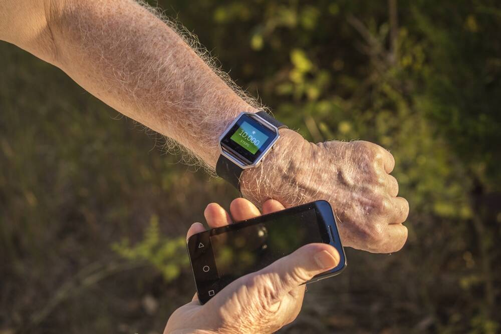 STEP BY STEP - Fitness trackers can help get you moving.
