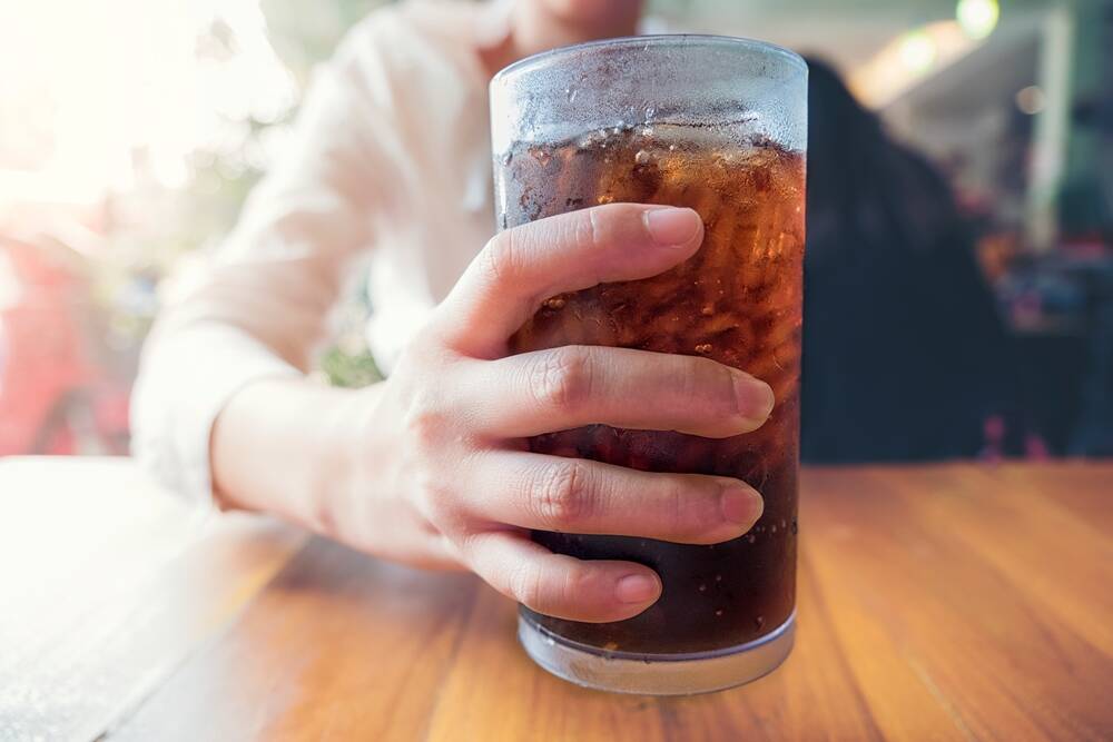 People who regularly drink sugary soft drinks are more at risk of several types of cancer than those who don't say researchers. Photo: Shutterstock