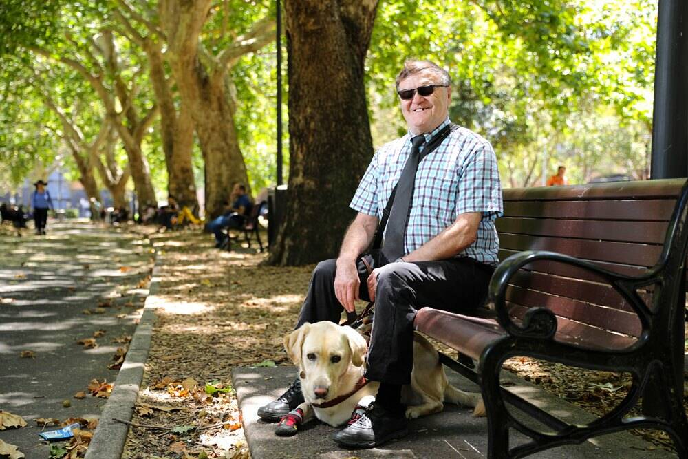 YEAR OF THE DOG - Ian Florek, with his Guide Dog Bryson, is looking forward to the guided tour of Lunar Lanterns in Sydney's Circular Quay for people with vision impairments.