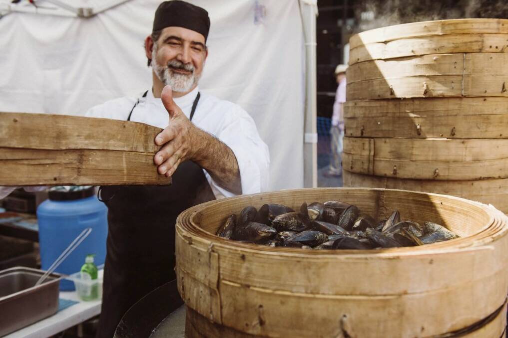 IF YOU’VE GOT ‘EM, FLEX ‘EM – Simply Spanish chef Milton Cadavid gets ready to work wonders with mussels.