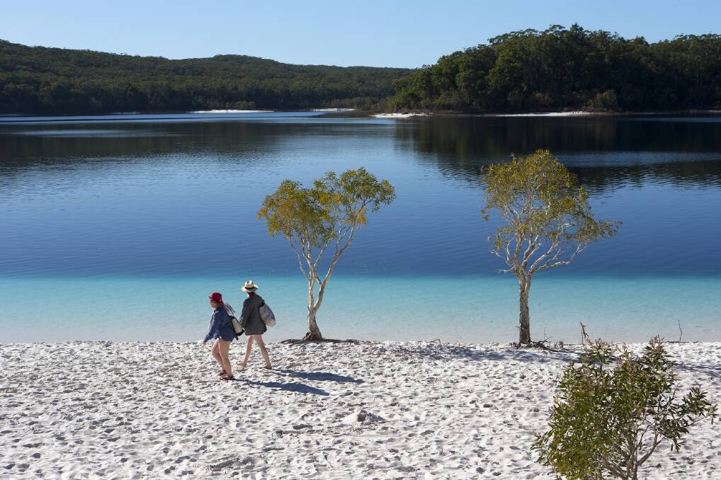 Let your toes sink into the powder white sand at Lake McKenzie. Photo Fraser Coast Tourism and Events.