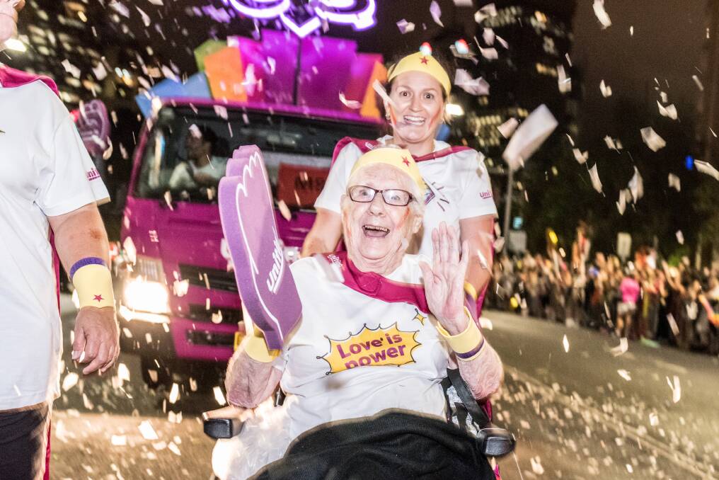 GREY PRIDE – Uniting resident Alma Berry, 85, with a Uniting carer at the Sydney Gay and Lesbian Mardi Gras.