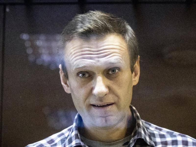 Alexei Navalny was sentenced to jail for parole violations he called trumped up.