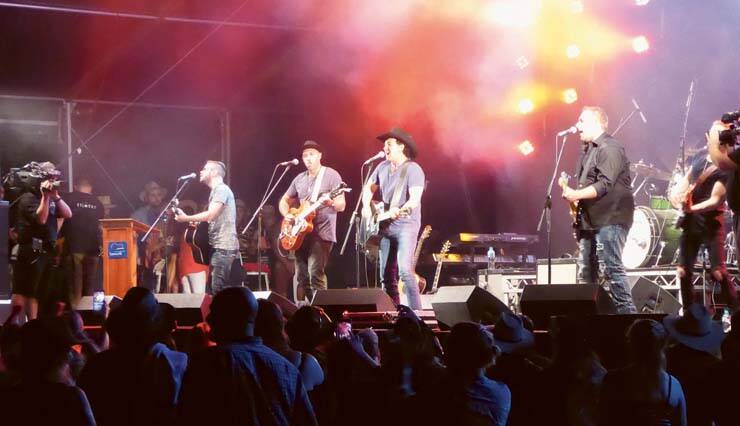 MORE THAN A LITTLE BIT COUNTRY - Performers rock the stage at the Tamworth Music Festival.
