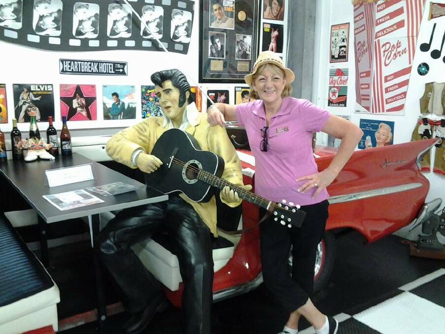THE KING AND I – Superfan Di Ainsworth is all set for the Hunter Elvis Festival. She’s pictured at the Lost in the ’50s car museum at Cameron Park, near West Wallsend.