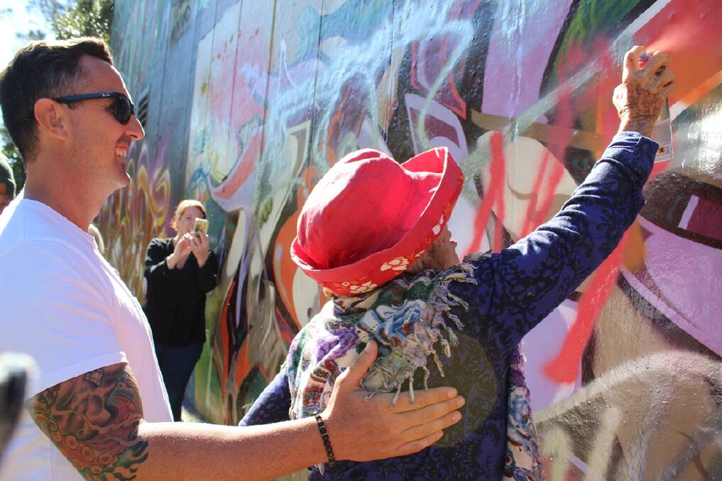 TAG A FRIEND - Street artist Davey Mac (aka Teazer) teaches Feros Care resident Nina Marzi the art of tagging.
