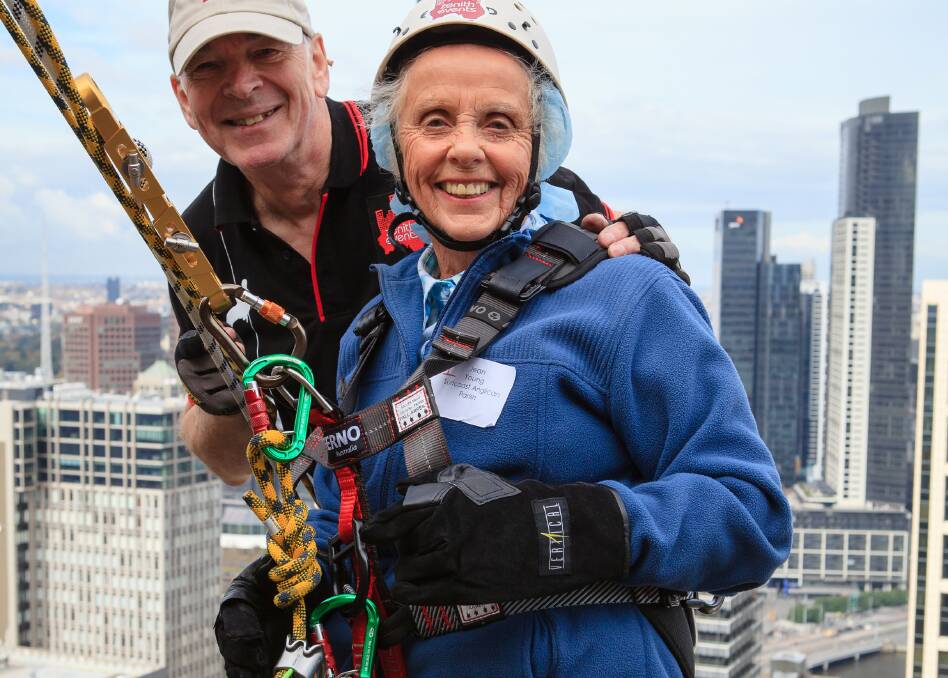 Jean Young about to step over the edge of the St James Building in Melbourne during last year's Altitude Shift