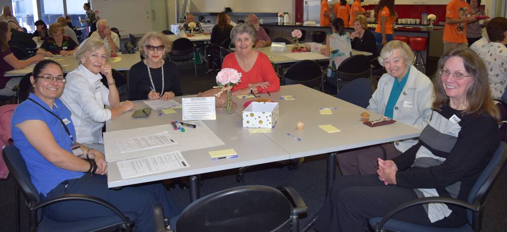 STEADY FLOW OF INFORMATION – Participants at a recent falls forum provide feedback on a planned prevention campaign.