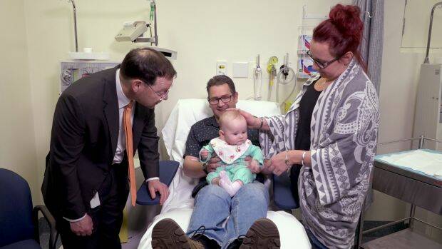 Professor John Rasko with Mark Lee, his partner and his daughter, who is a carrier for haemophilia B. Photo: Supplied