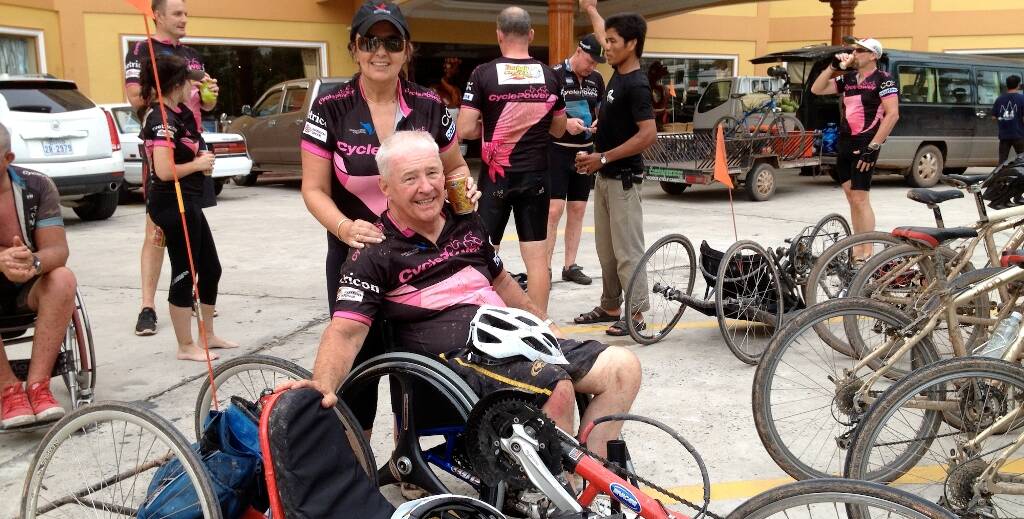 Got there! Jeremy and his wife Jann relax after the finish of the 2012 Cambodian ride.