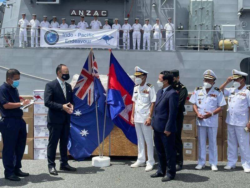 COVID supplies brought by HMAS Anzac are handed over to Cambodian officials in Sihanoukville.