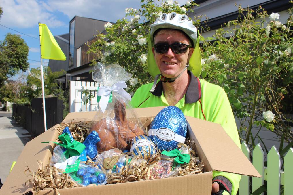 Postie Daniel Flemming is part of the Australia Post team delivering Easter eggs this year.