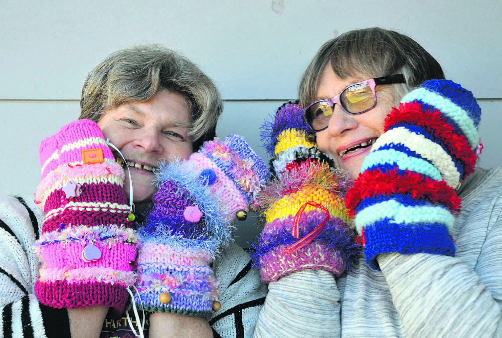IDEA CATCHING ON – Gorokan Guardian Angels twiddlemuff knitters Stephenie Milne and Ruth Burton.